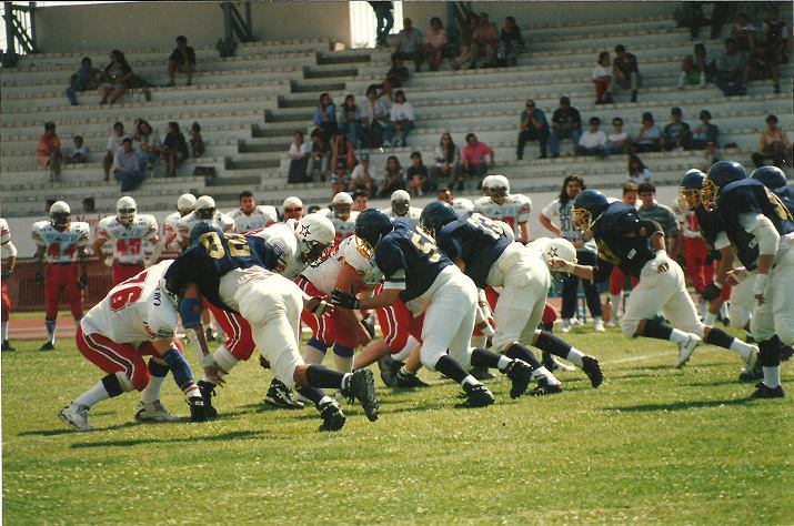 "Boston" como end derecho en un partido de los Cougars