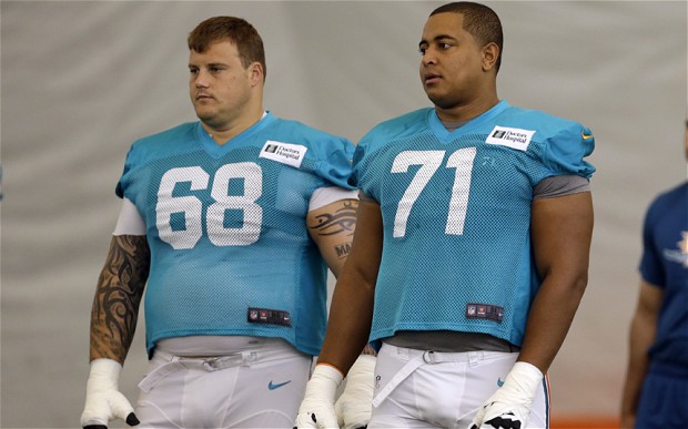 Richie Incognito (izquierda) y Jonathan Martin (AP)
