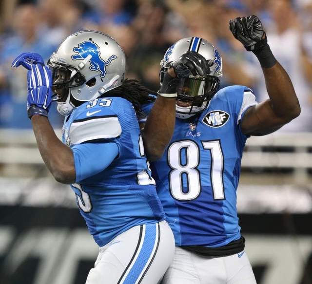 Calnvin Johnson celebra uno de sus touchdowns (AP)