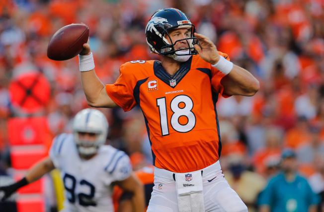 Manning y Thomas demasiado para los Colts