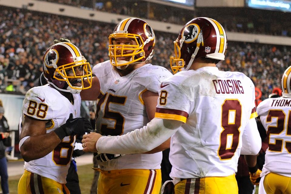 Cousins celebra uno de sus pases de touchdown (Redskins.com)